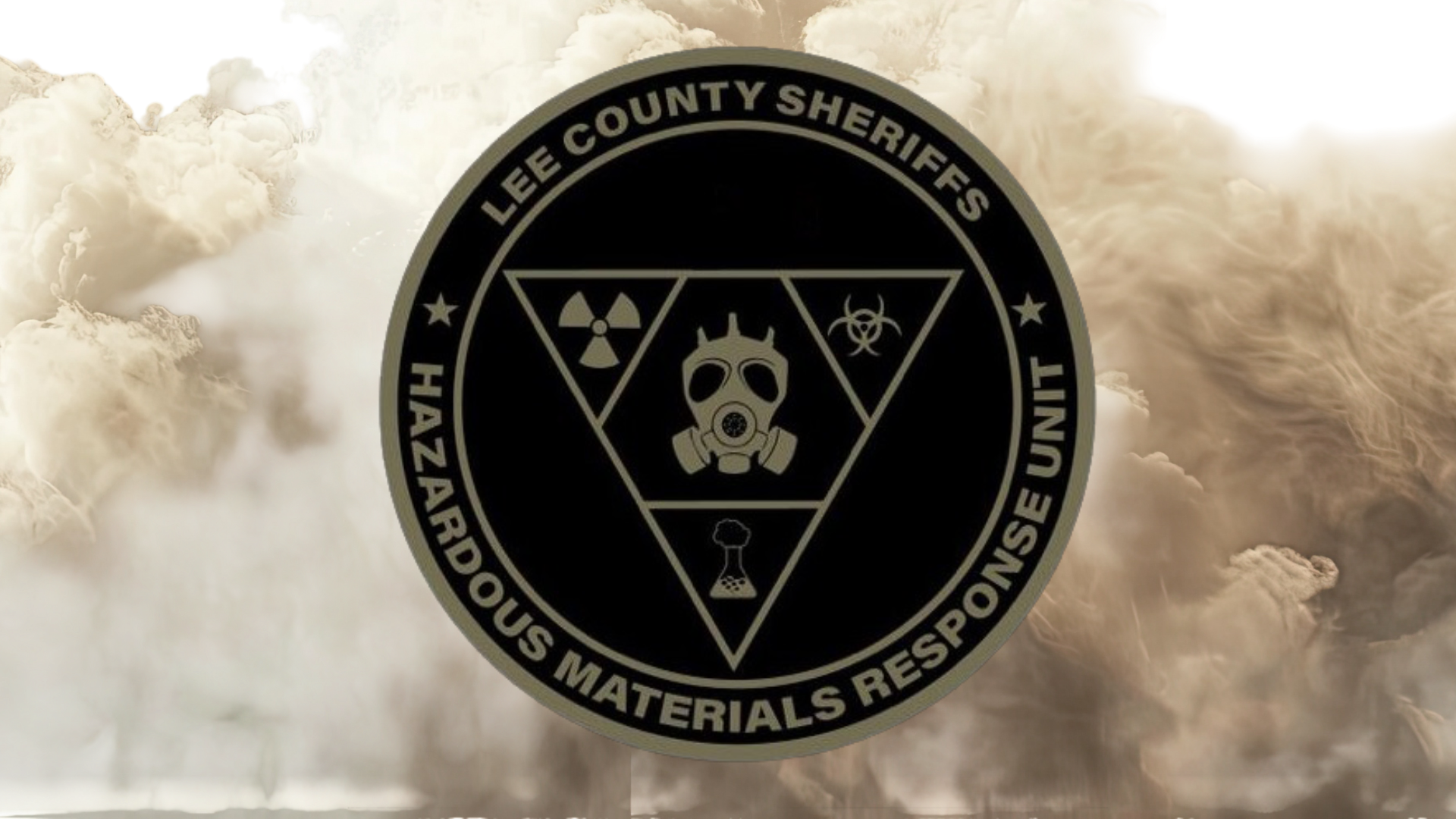 Lee County Sheriff's Hazardous Materials Response Unit emblem over billowing smoke